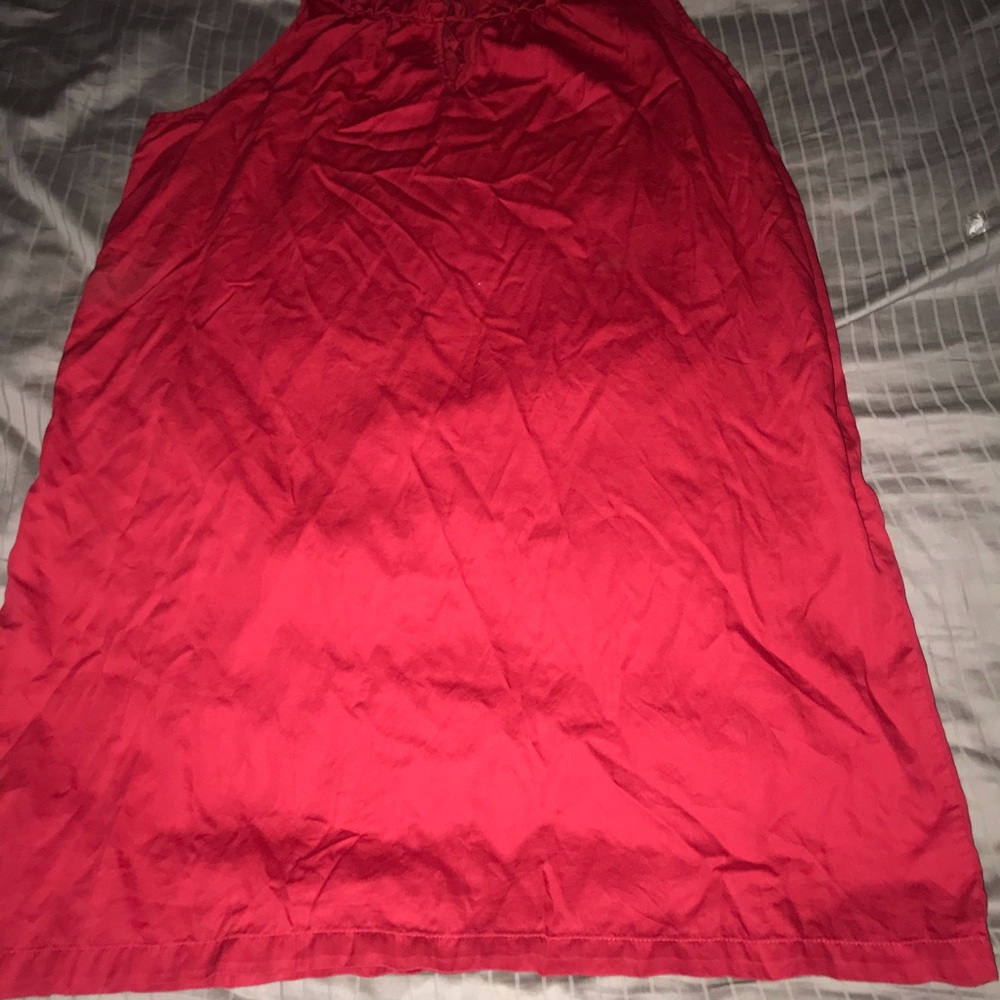 Red knee length A-line dress with pockets.